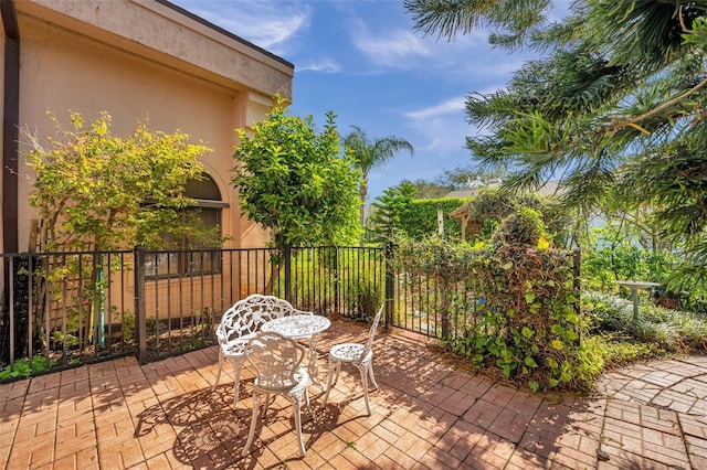 view of patio / terrace with fence