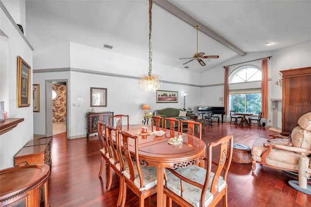 dining area featuring high vaulted ceiling, visible vents, wood finished floors, and beamed ceiling