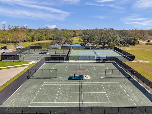 view of sport court with fence