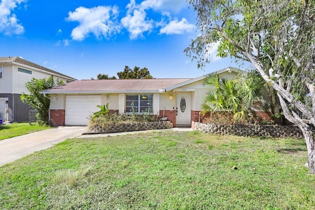 single story home with a garage, concrete driveway, stucco siding, a front lawn, and brick siding