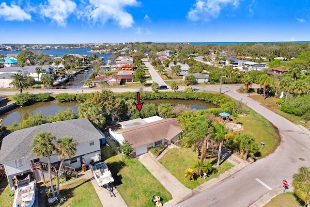 aerial view with a water view and a residential view