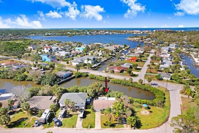 aerial view with a water view and a residential view