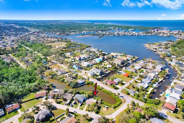 aerial view with a residential view and a water view