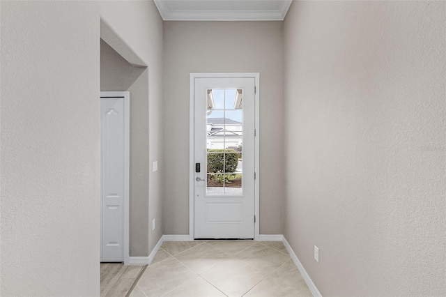 17541 Corkwood Bend Trl, Punta Gorda, FL 33982 - entryway featuring ornamental molding, baseboards, and light tile patterned flooring