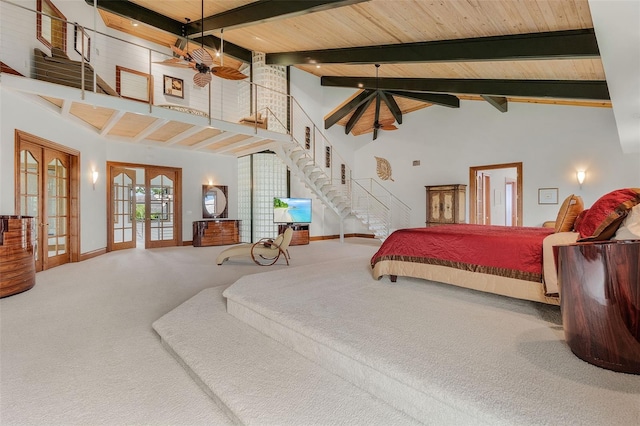 bedroom featuring wooden ceiling, beamed ceiling, french doors, carpet floors, and high vaulted ceiling