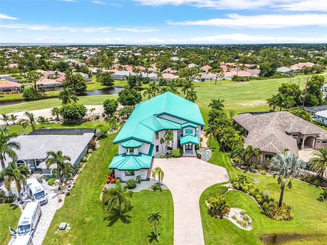 birds eye view of property featuring a water view and a residential view