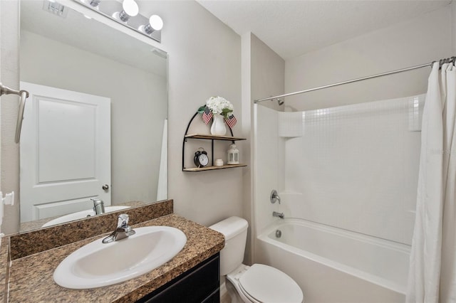 bathroom with a textured ceiling, toilet, vanity, visible vents, and shower / bath combo with shower curtain