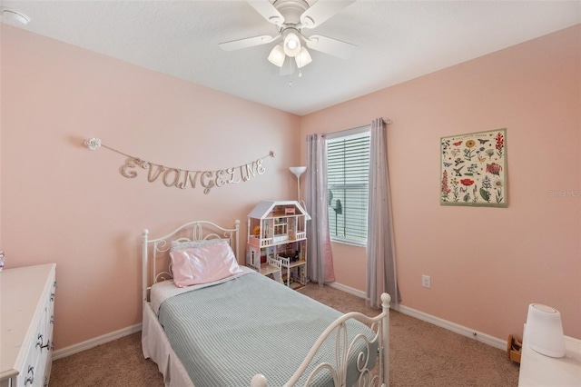 bedroom featuring light carpet, ceiling fan, and baseboards