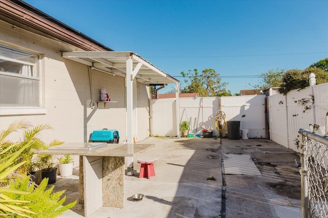 view of patio featuring a fenced backyard