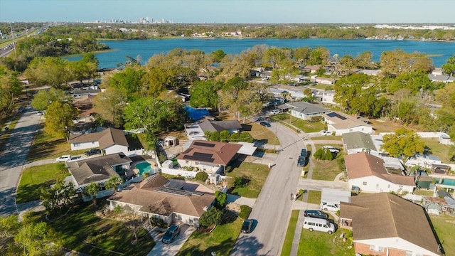 birds eye view of property featuring a residential view and a water view