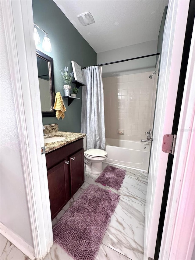 bathroom with a textured ceiling, marble finish floor, toilet, and visible vents