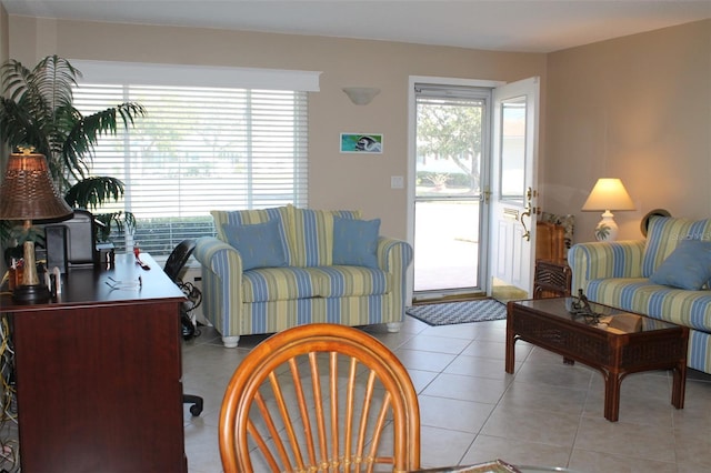 living area featuring light tile patterned floors