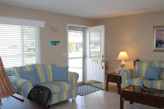 living room featuring light tile patterned floors