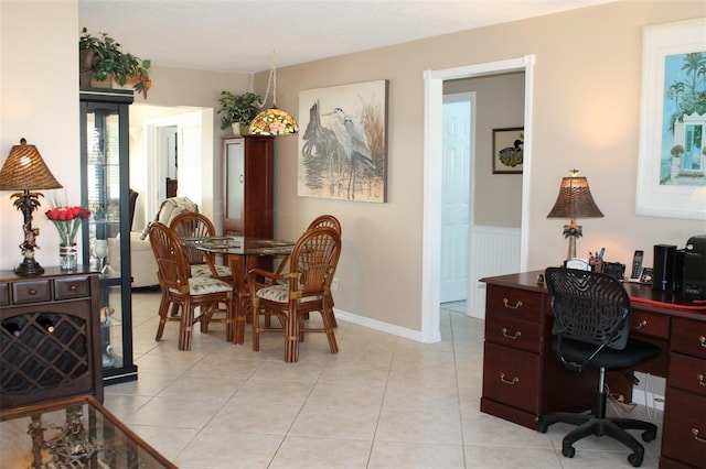 dining room with light tile patterned flooring