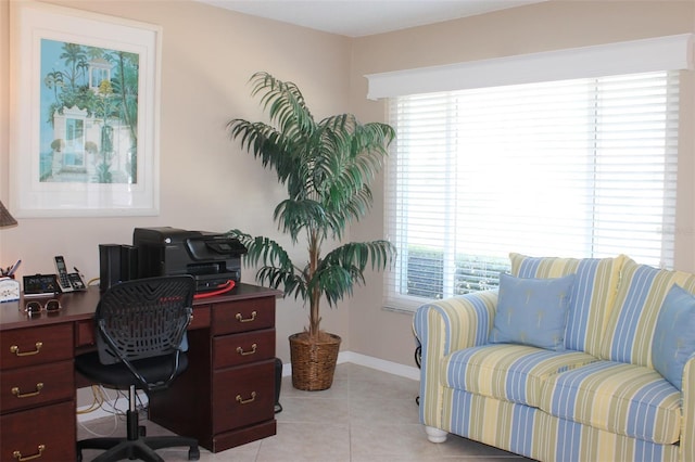 office with light tile patterned floors and baseboards