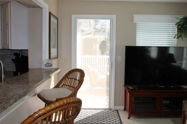 interior space with light tile patterned floors