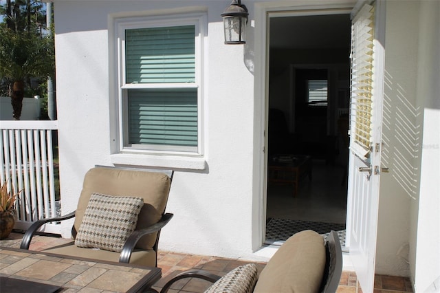 exterior space featuring stucco siding