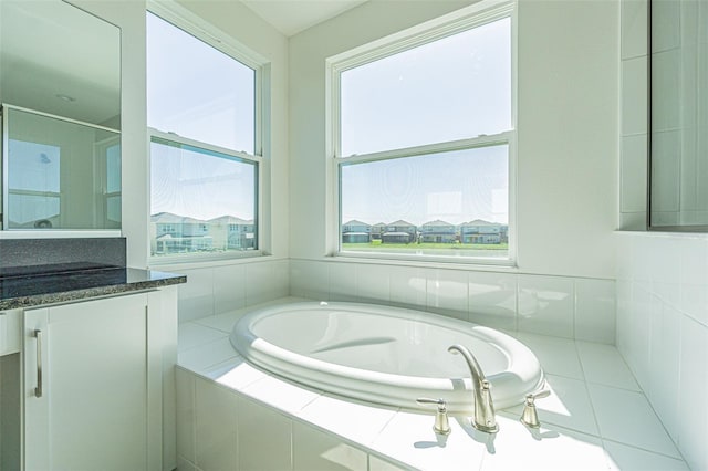 full bathroom featuring a stall shower and a bath