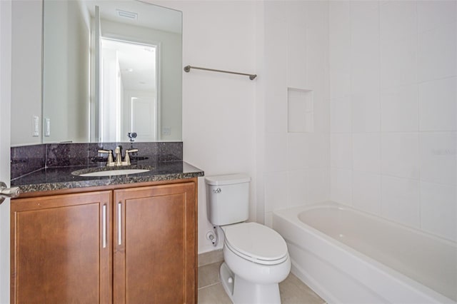 bathroom featuring tile patterned flooring, toilet, visible vents, vanity, and tub / shower combination