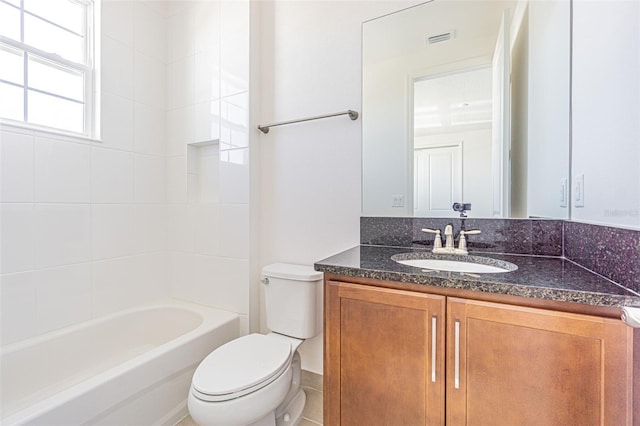 full bath featuring toilet, visible vents, washtub / shower combination, and vanity