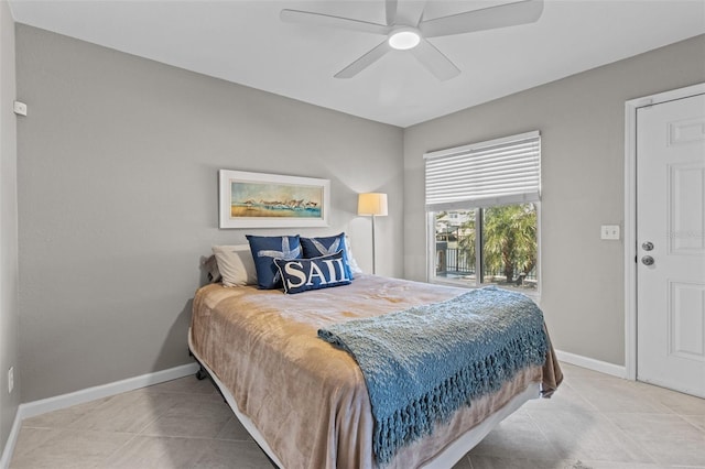 tiled bedroom with baseboards, a ceiling fan, and access to exterior