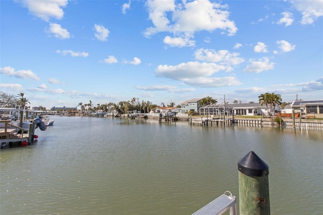 view of water feature with a dock