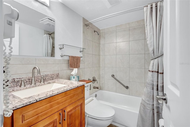 bathroom featuring tile walls, tasteful backsplash, shower / bathtub combination with curtain, toilet, and vanity