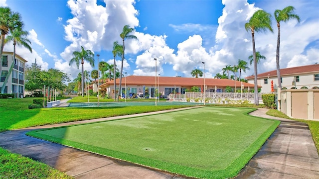 view of community with fence