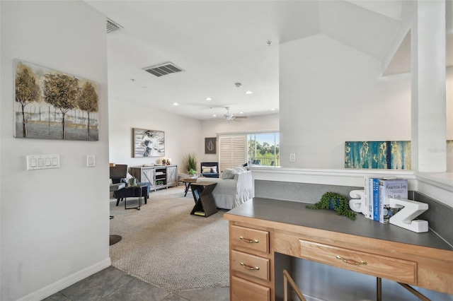office featuring carpet, visible vents, a ceiling fan, and recessed lighting