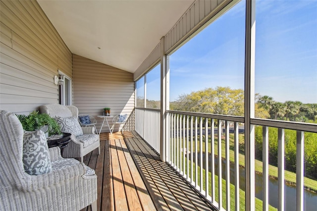 balcony featuring a water view