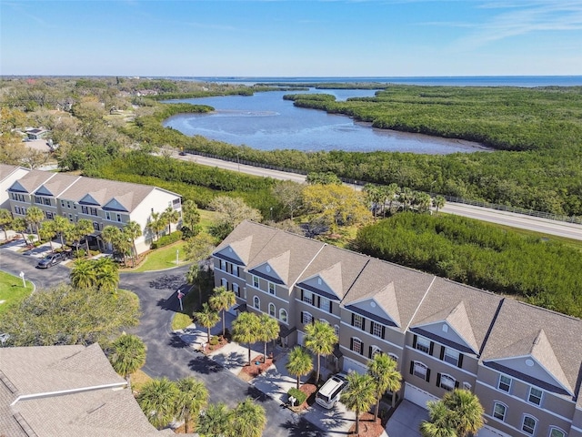 bird's eye view with a water view