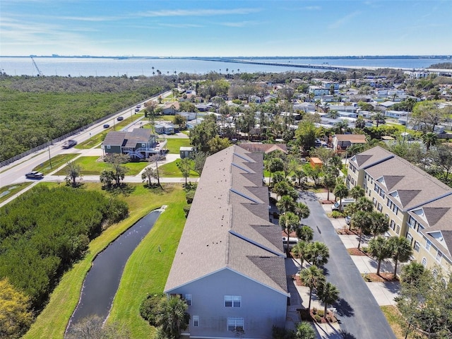 aerial view featuring a water view and a residential view