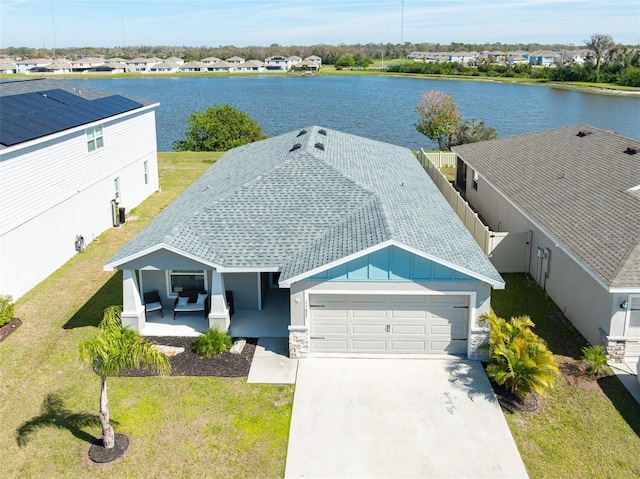 drone / aerial view featuring a water view