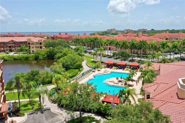 bird's eye view with a water view and a residential view