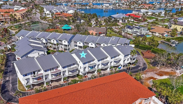 aerial view featuring a residential view and a water view