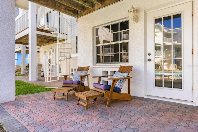 view of patio / terrace with stairway