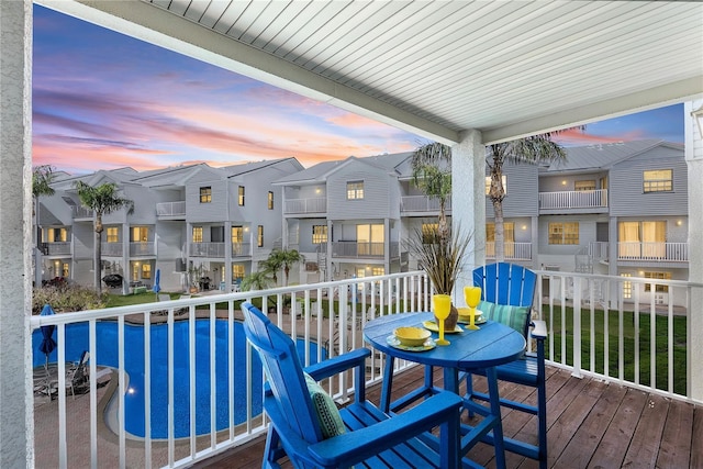 balcony at dusk with a residential view