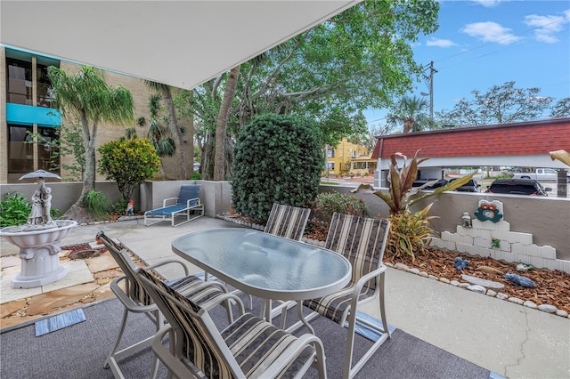 view of patio featuring outdoor dining space