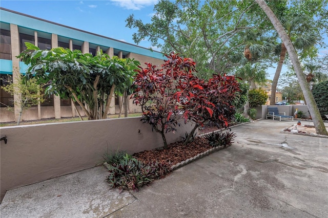 view of patio featuring fence