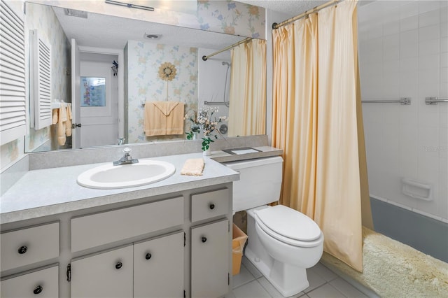 bathroom with a textured ceiling, toilet, a shower with shower curtain, vanity, and wallpapered walls