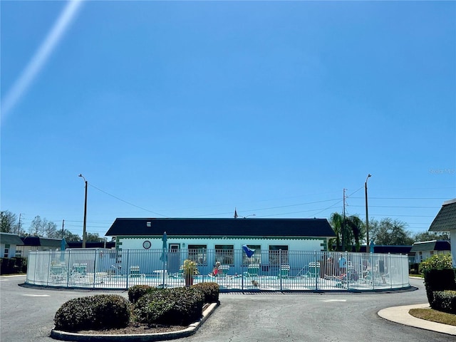 view of property featuring fence