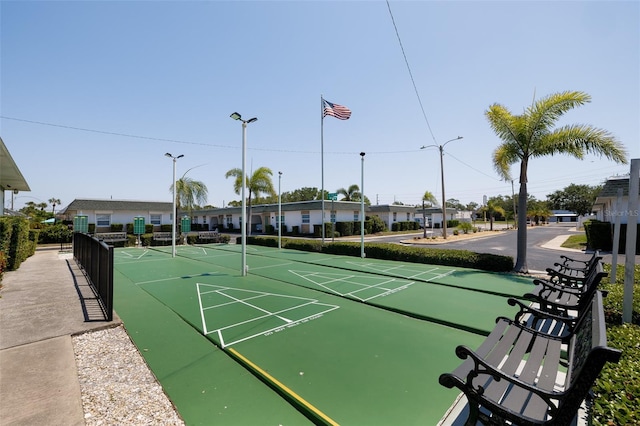 view of home's community with shuffleboard