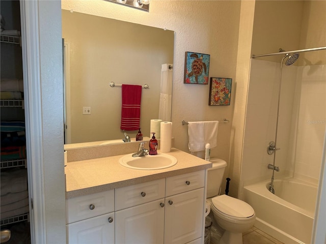 full bathroom featuring shower / bath combination, vanity, and toilet