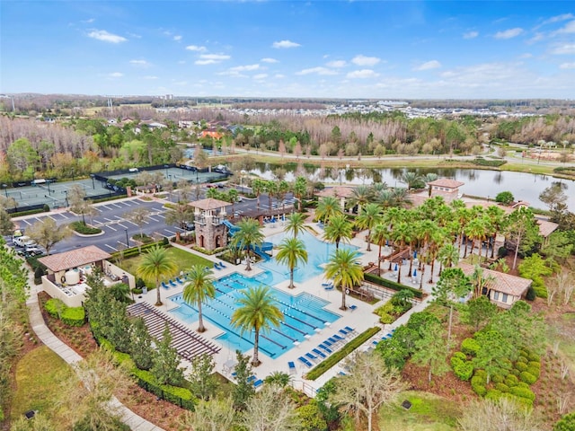 birds eye view of property featuring a water view