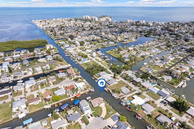 bird's eye view featuring a water view and a residential view