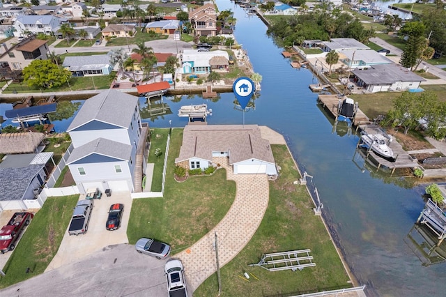 aerial view with a residential view and a water view