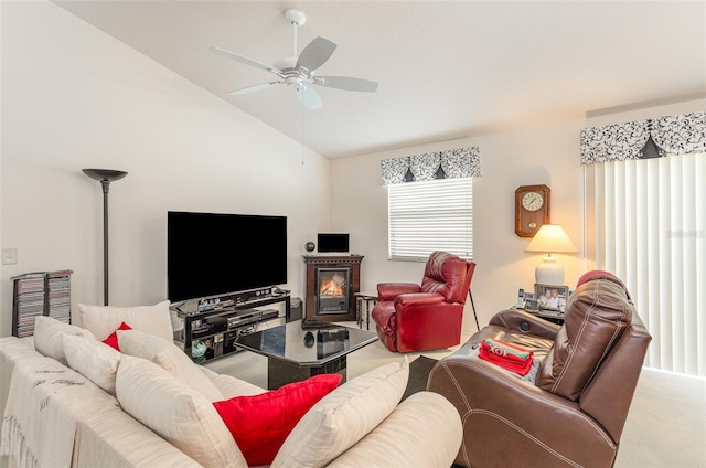 living room featuring carpet, vaulted ceiling, and ceiling fan