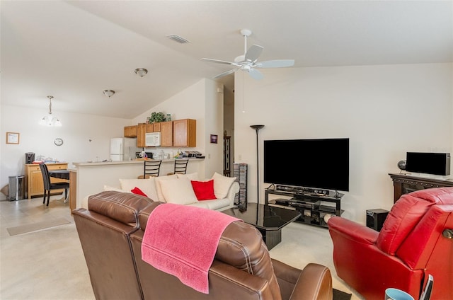 living area featuring light carpet, vaulted ceiling, visible vents, and ceiling fan with notable chandelier