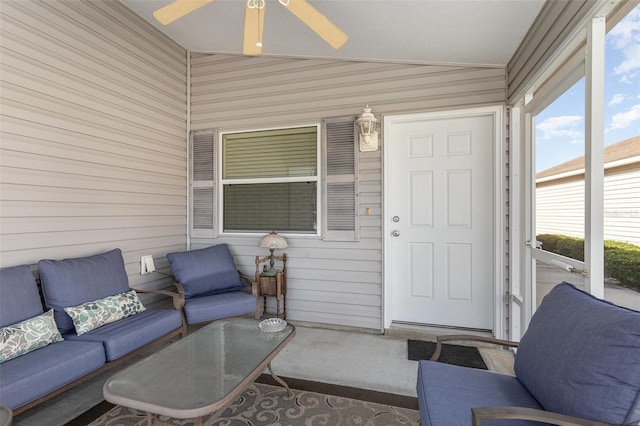 sunroom / solarium featuring a ceiling fan and lofted ceiling