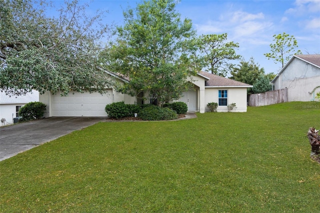 5331 Berrien Ave, Spring Hill, FL 34608 - view of front of property with a garage, concrete driveway, fence, a front lawn, and stucco siding